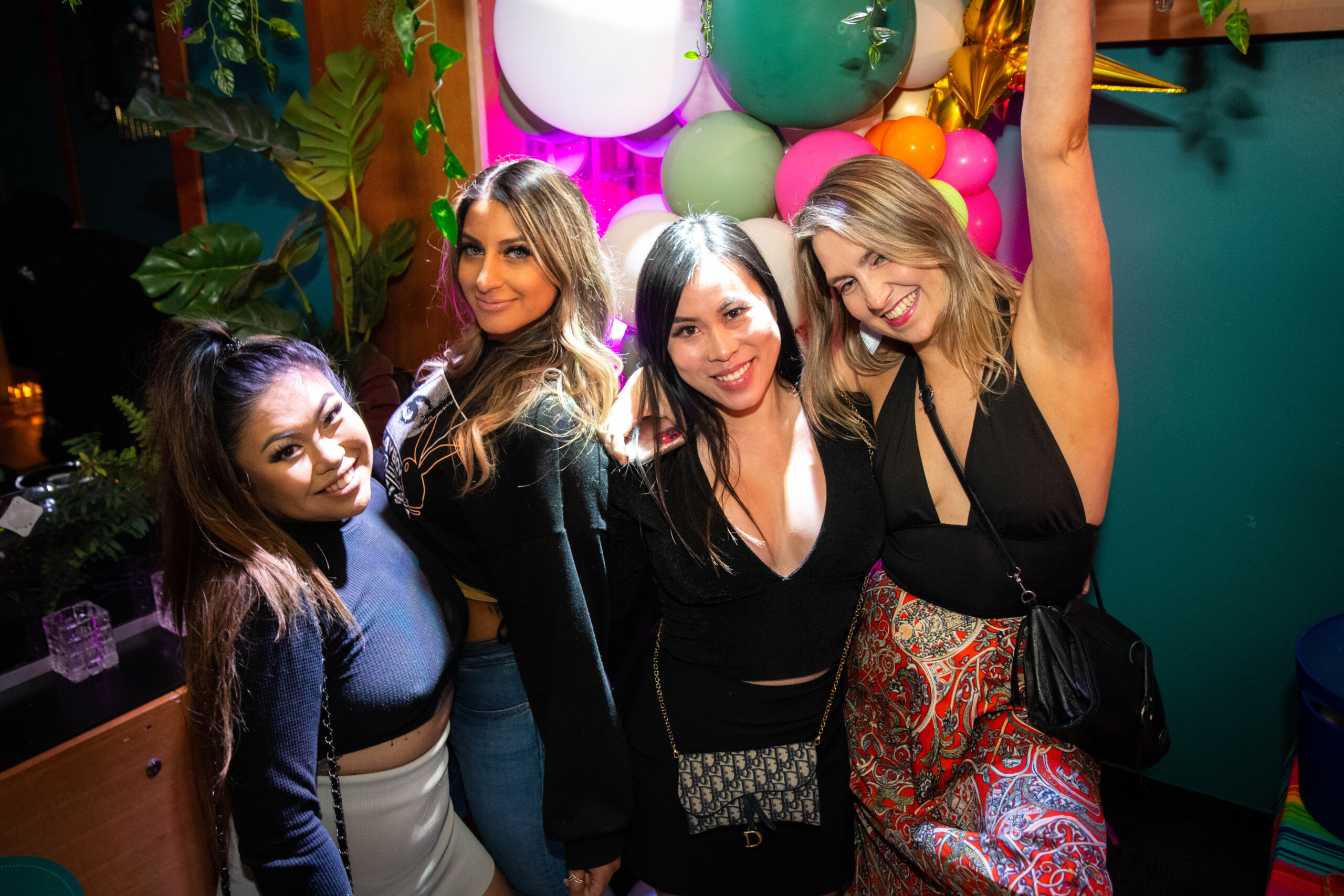 Four beautiful women smiling and having a fantastic time at The Loft at The Pawn Shop YVR, our private event space in downtown Vancouver, BC.